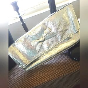 Silver, metalic clutch handbag, NWOT.
